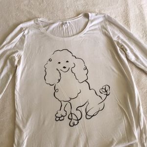 White shirt with a drawing of a cute dog